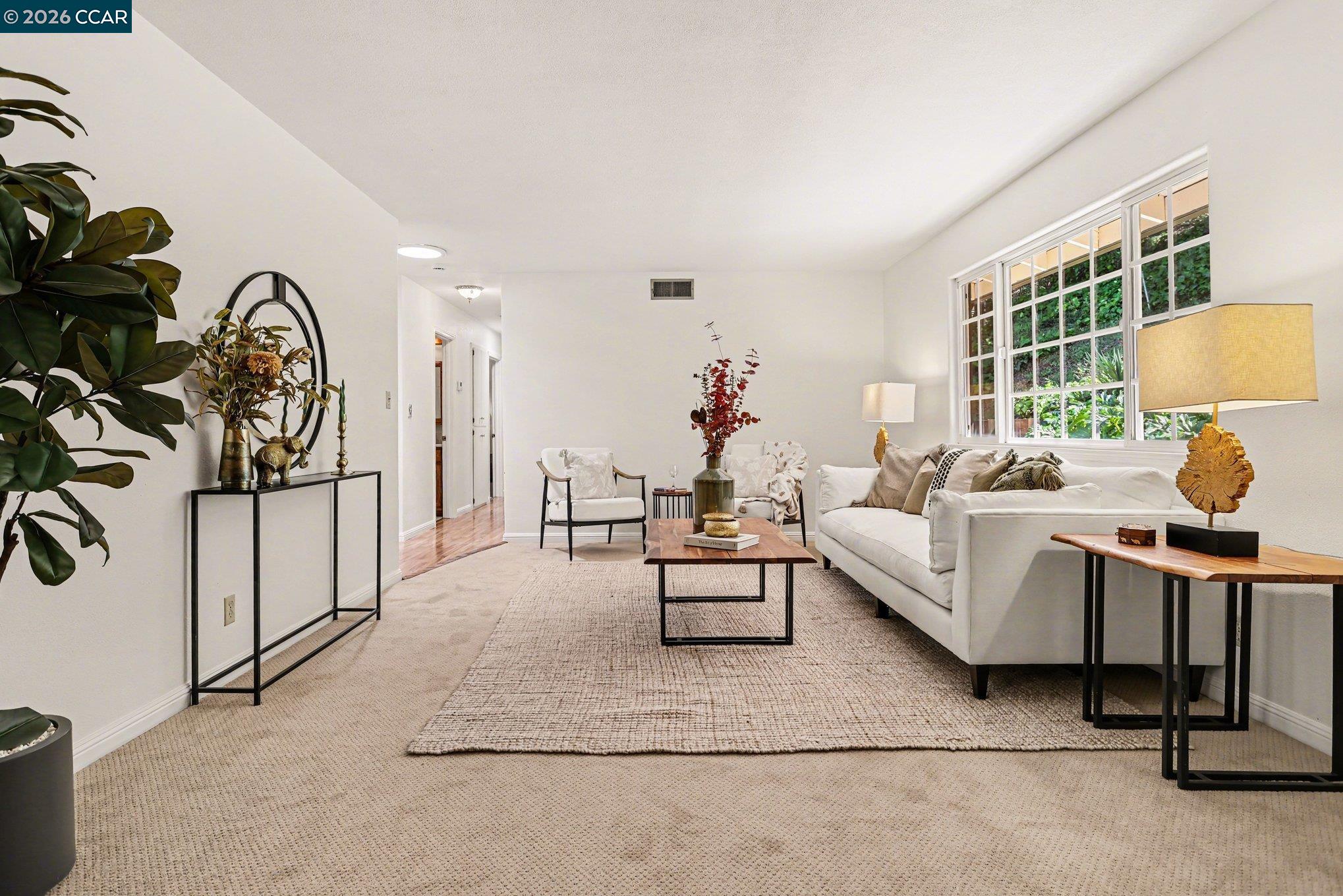 1451 Franklin Canyon Road Martinez, CA 94553 - Photo 10 of 45 a living room with furniture and a large window