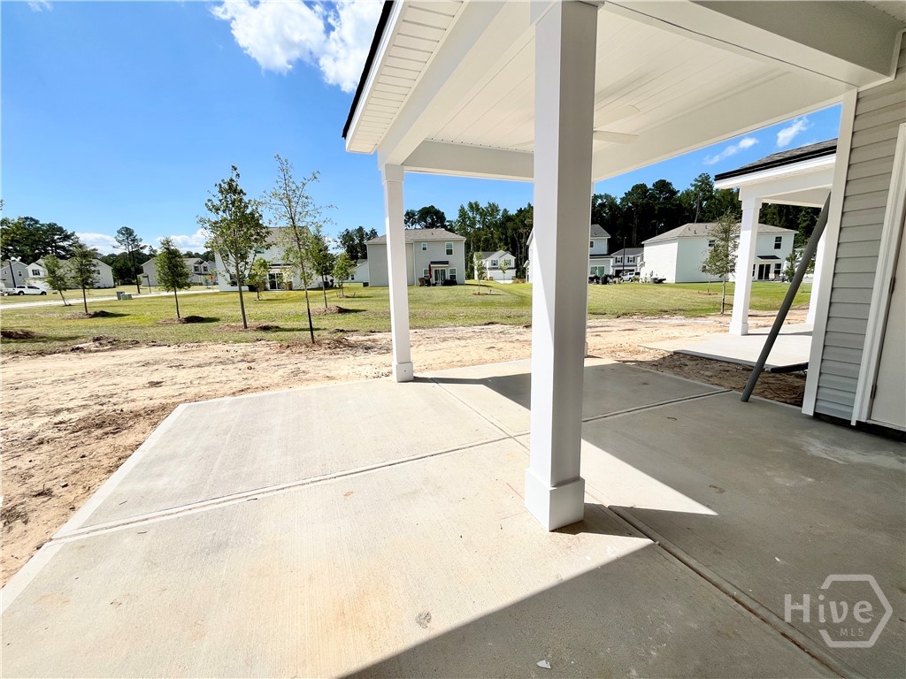 105 Pinebury Road Pooler, GA 31322 - Photo 18 of 24 Photo taken 7.3.26. HOME IS UNDER CONSTRUCTION. Huge covered back porch with expanded patio - great for entertaining and grilling!
