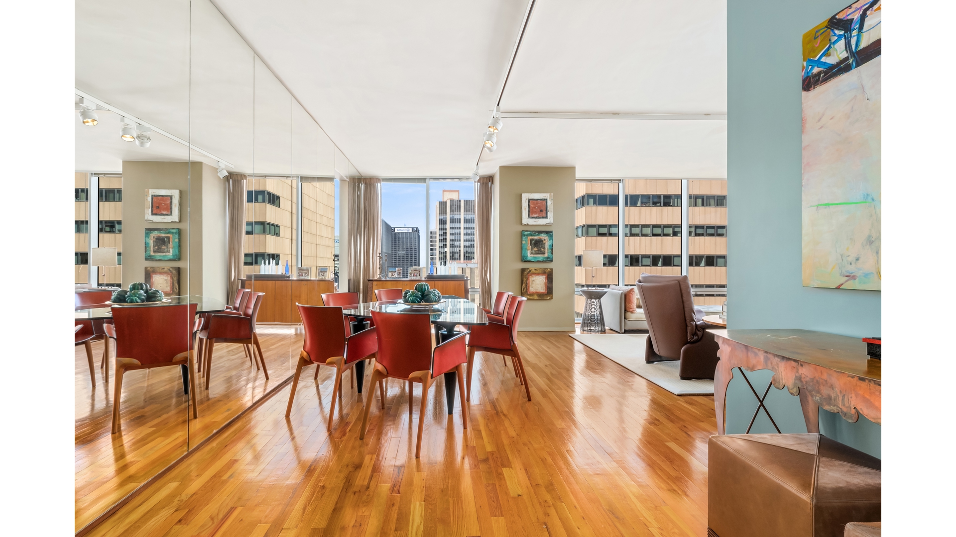 641 5th Avenue, Unit 35A Manhattan, NY 10022 - Photo 2 of 10 wooden floor of a livingroom with furniture and wooden floor