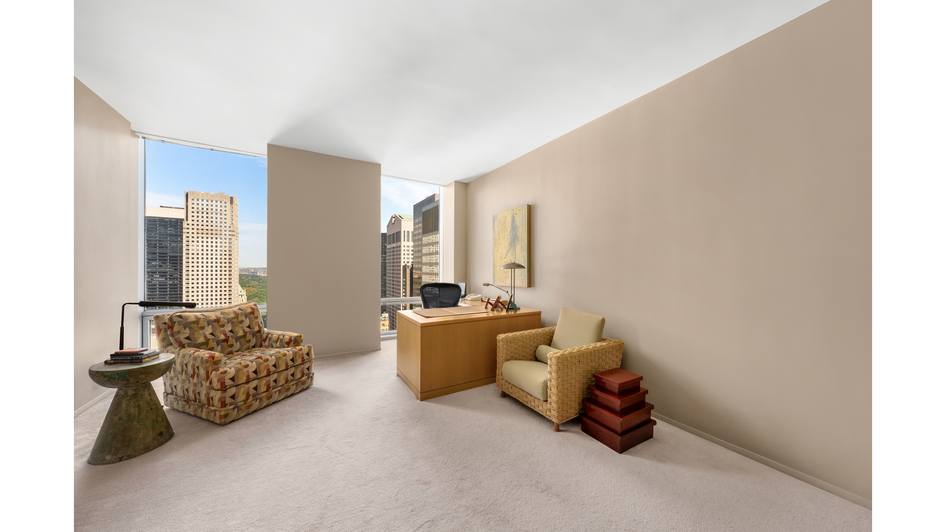 641 5th Avenue, Unit 35A Manhattan, NY 10022 - Photo 5 of 10 a living room with furniture and a large window