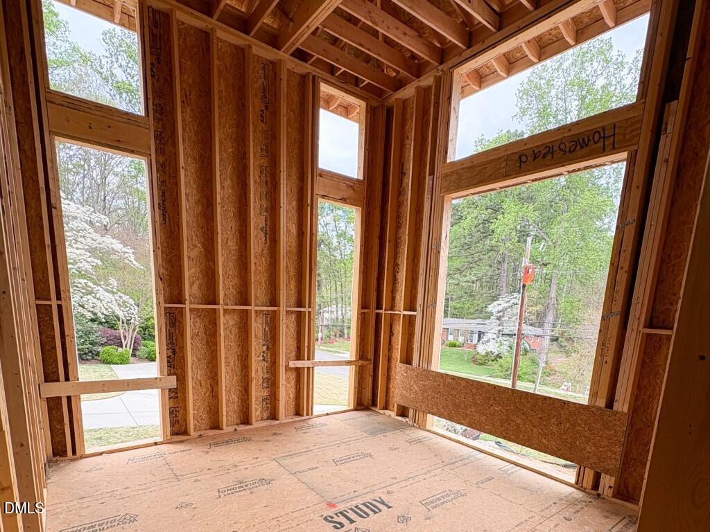 961 Wimbleton Drive Raleigh, NC 27609 - Photo 9 of 38 a view of a room with a large window