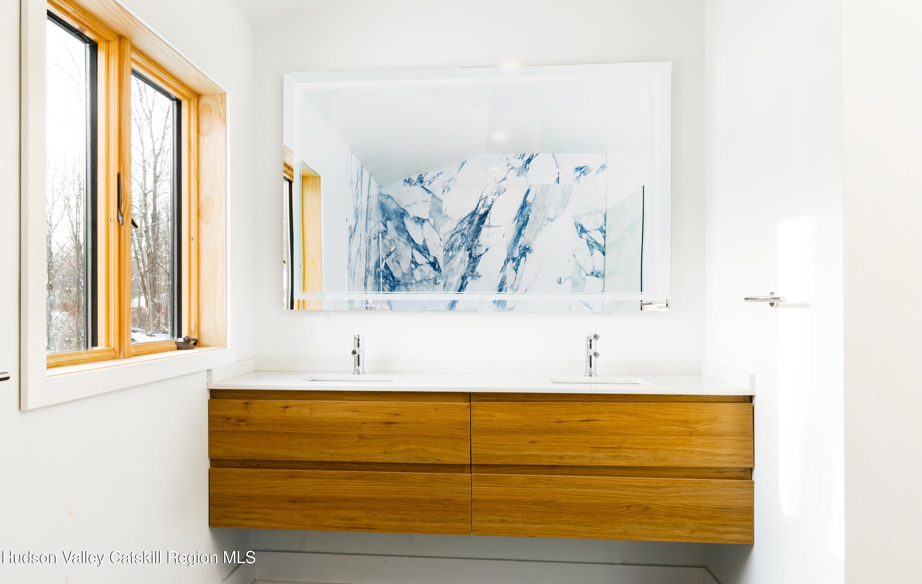 513 Myrtle Avenue Wallkill, NY 12589 - Photo 24 of 62 a bathroom with a bathtub and a window