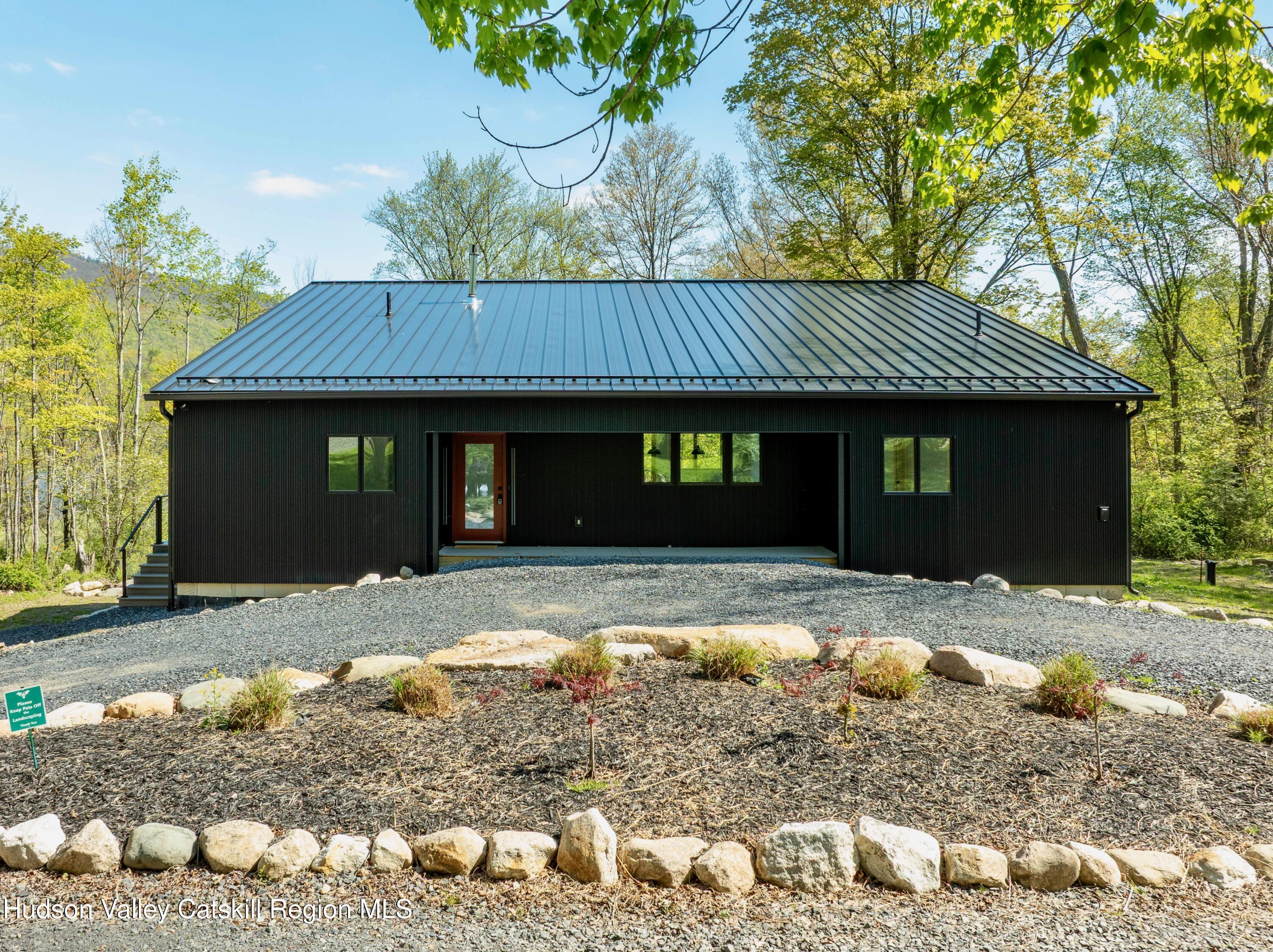 513 Myrtle Avenue Wallkill, NY 12589 - Photo 47 of 62 a front view of a house with a yard