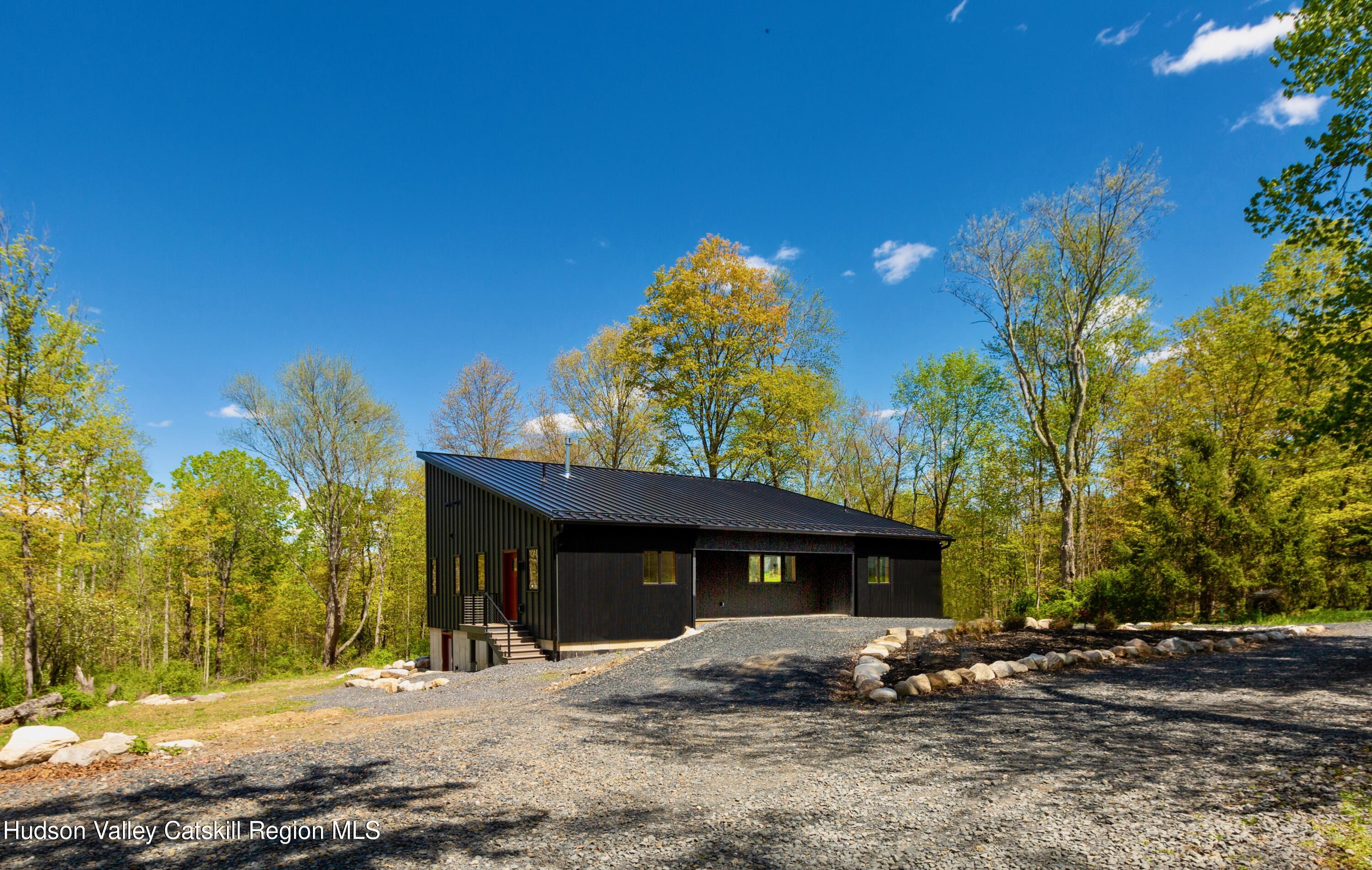 513 Myrtle Avenue Wallkill, NY 12589 - Photo 50 of 62 a front view of a house with a yard