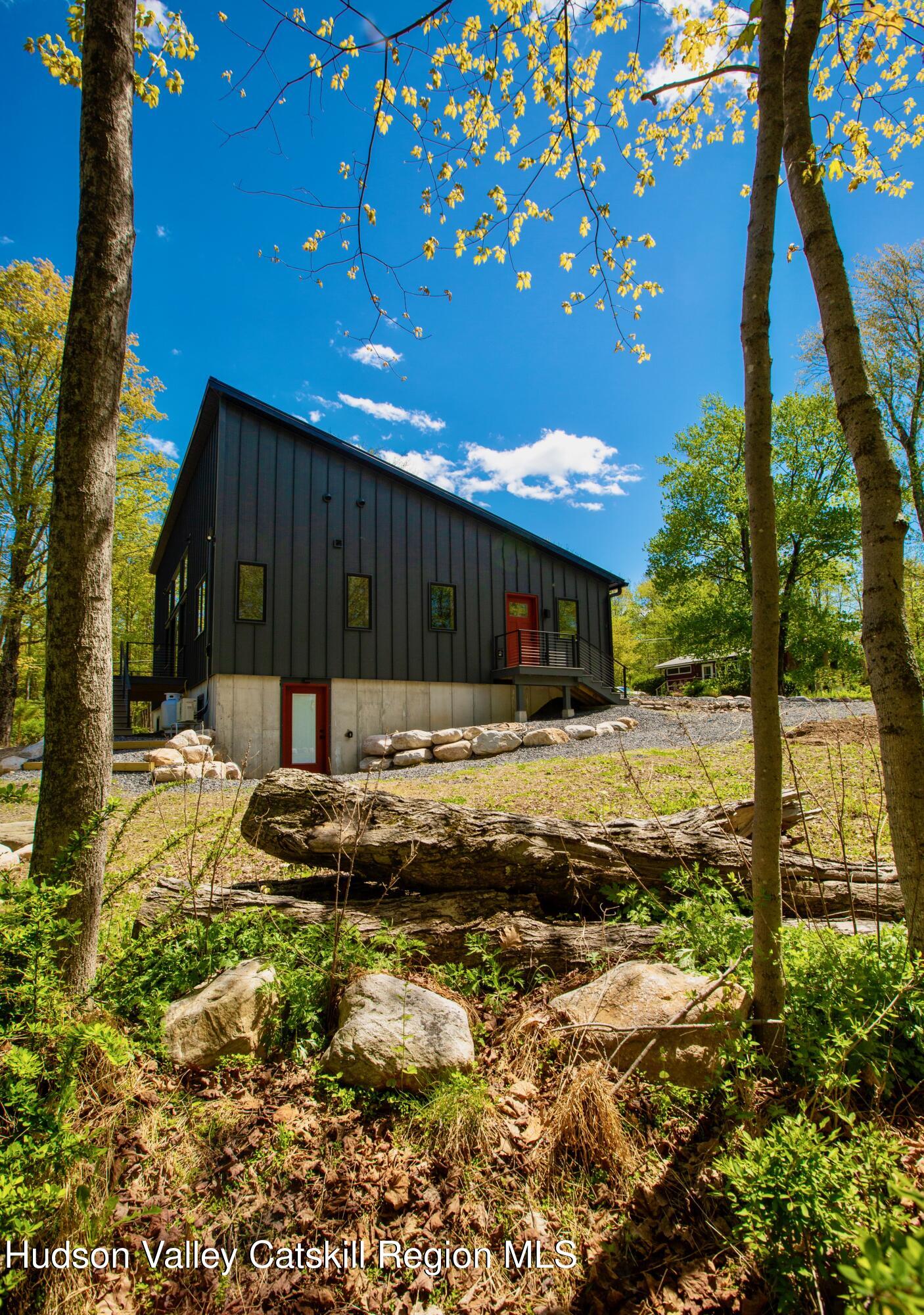 513 Myrtle Avenue Wallkill, NY 12589 - Photo 58 of 62 a view of a house with backyard and sitting area
