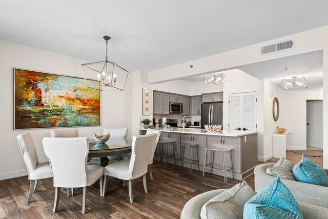 a bathroom with a toilet a sink and a mirror