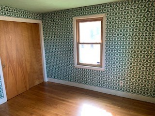 10 Laurel Road West Springfield, MA 01089 - Photo 12 of 15 an empty room with wooden floor