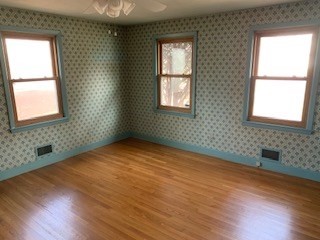 10 Laurel Road West Springfield, MA 01089 - Photo 14 of 15 an empty room with wooden floor and windows
