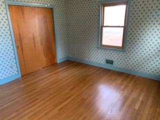 10 Laurel Road West Springfield, MA 01089 - Photo 15 of 15 an empty room with wooden floor and windows