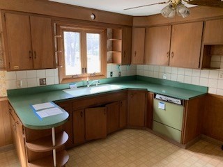 10 Laurel Road West Springfield, MA 01089 - Photo 5 of 15 a kitchen with a sink cabinets and window