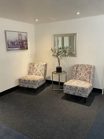 a bedroom with furniture and a couch