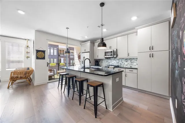 a bathroom with a toilet and shower