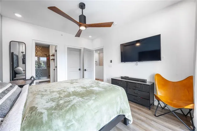 a bathroom with a shower and a sink