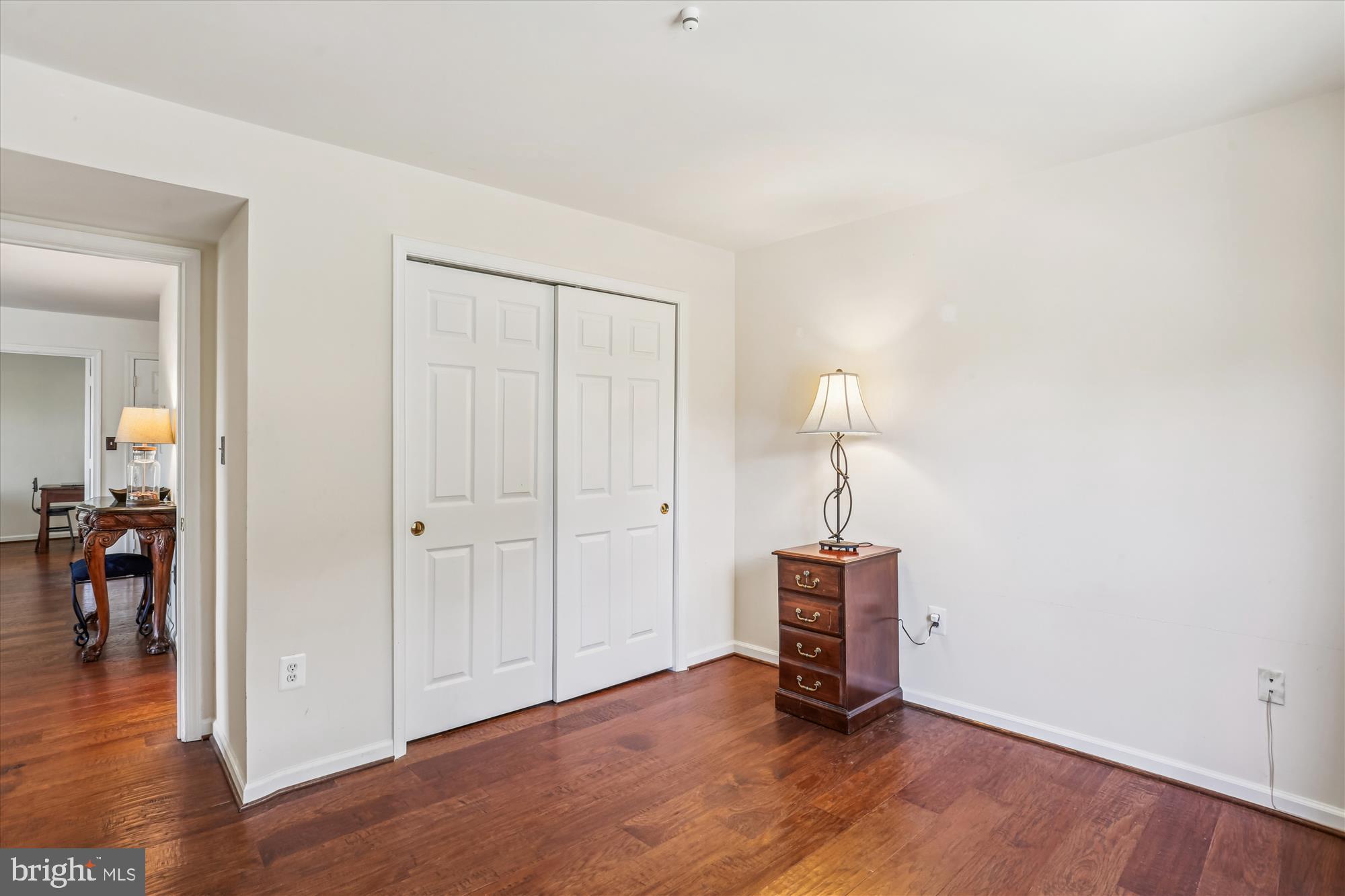302 Ridgepoint Place, Unit 16 Gaithersburg, MD 20878 - Photo 21 of 40 a view of a room with wooden floor wooden cabinet and windows