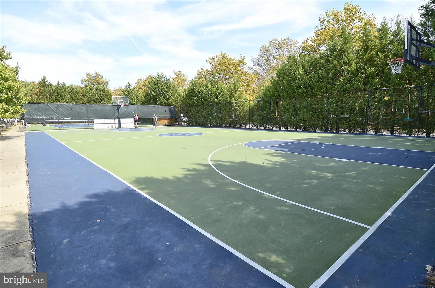 302 Ridgepoint Place, Unit 16 Gaithersburg, MD 20878 - Photo 30 of 40 a view of a tennis court