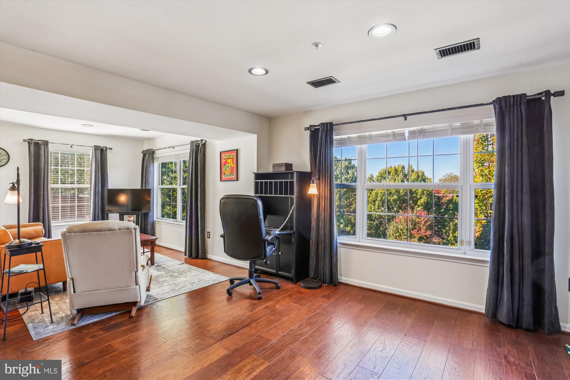 302 Ridgepoint Place, Unit 16 Gaithersburg, MD 20878 - Photo 9 of 40 a view of a workspace with furniture and a window