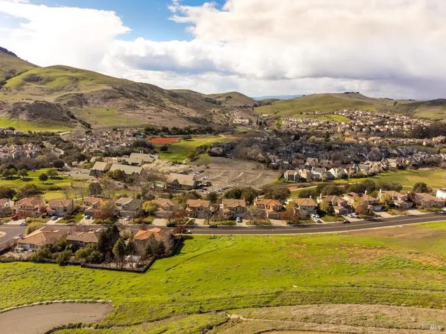 a view of a lake with mountains in the background