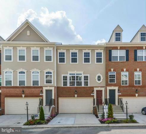 1003 Red Clover Road Gambrills, MD 21054 - Photo 1 of 30 a front view of a building with lot of windows