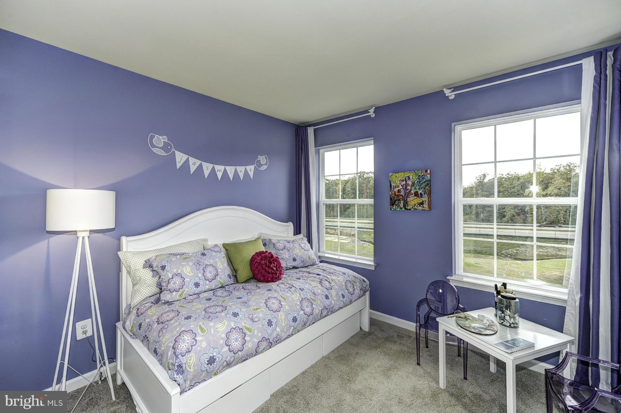 1003 Red Clover Road Gambrills, MD 21054 - Photo 18 of 30 a bedroom with a bed and wooden floor