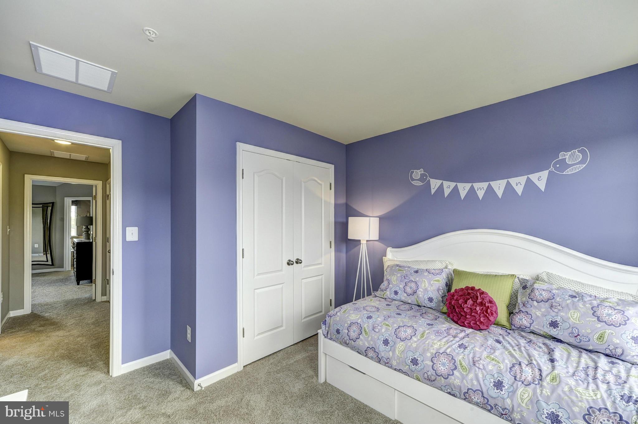 1003 Red Clover Road Gambrills, MD 21054 - Photo 19 of 30 a bedroom with a bed and dresser