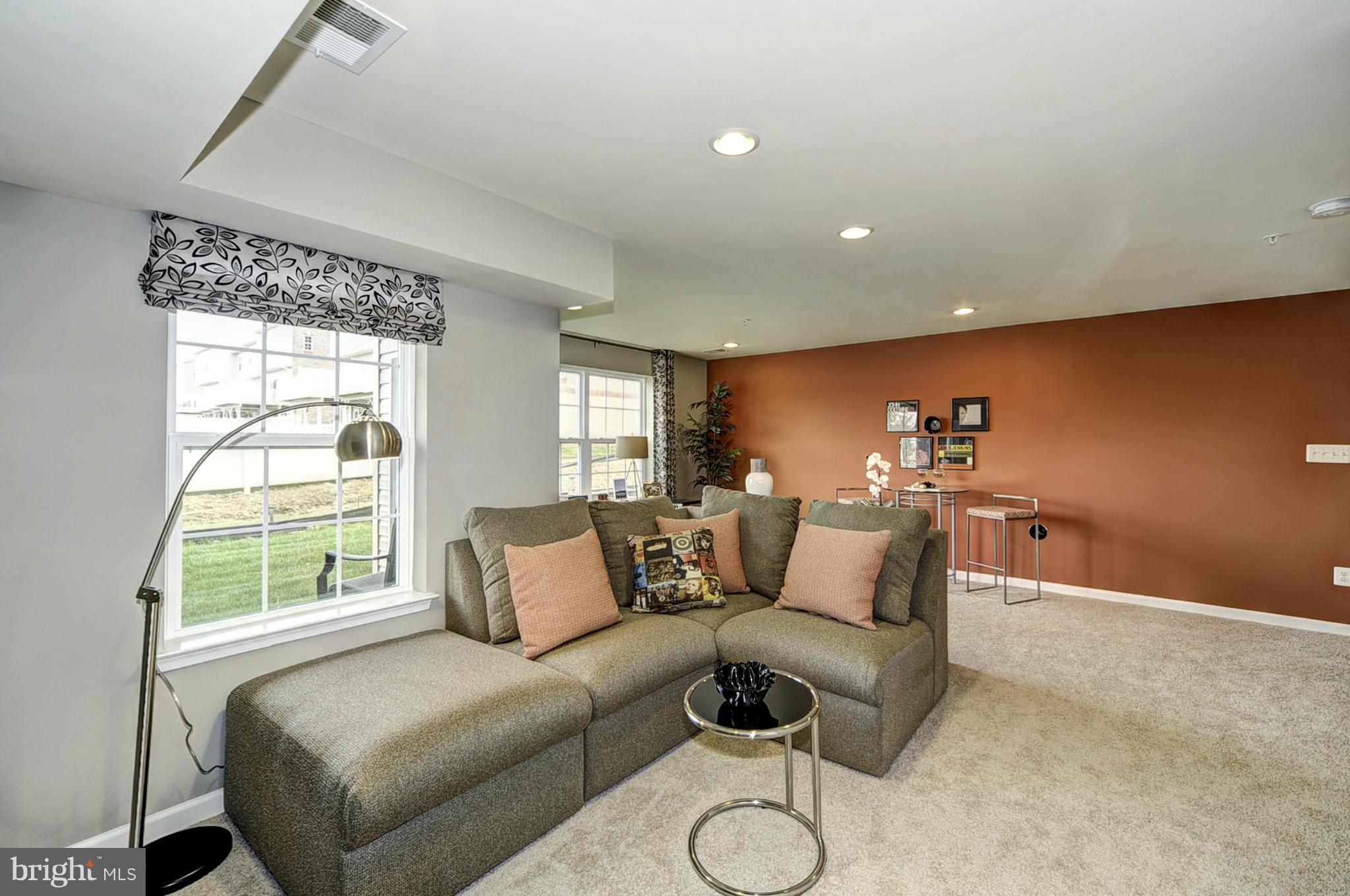 1003 Red Clover Road Gambrills, MD 21054 - Photo 23 of 30 a living room with furniture and a large window