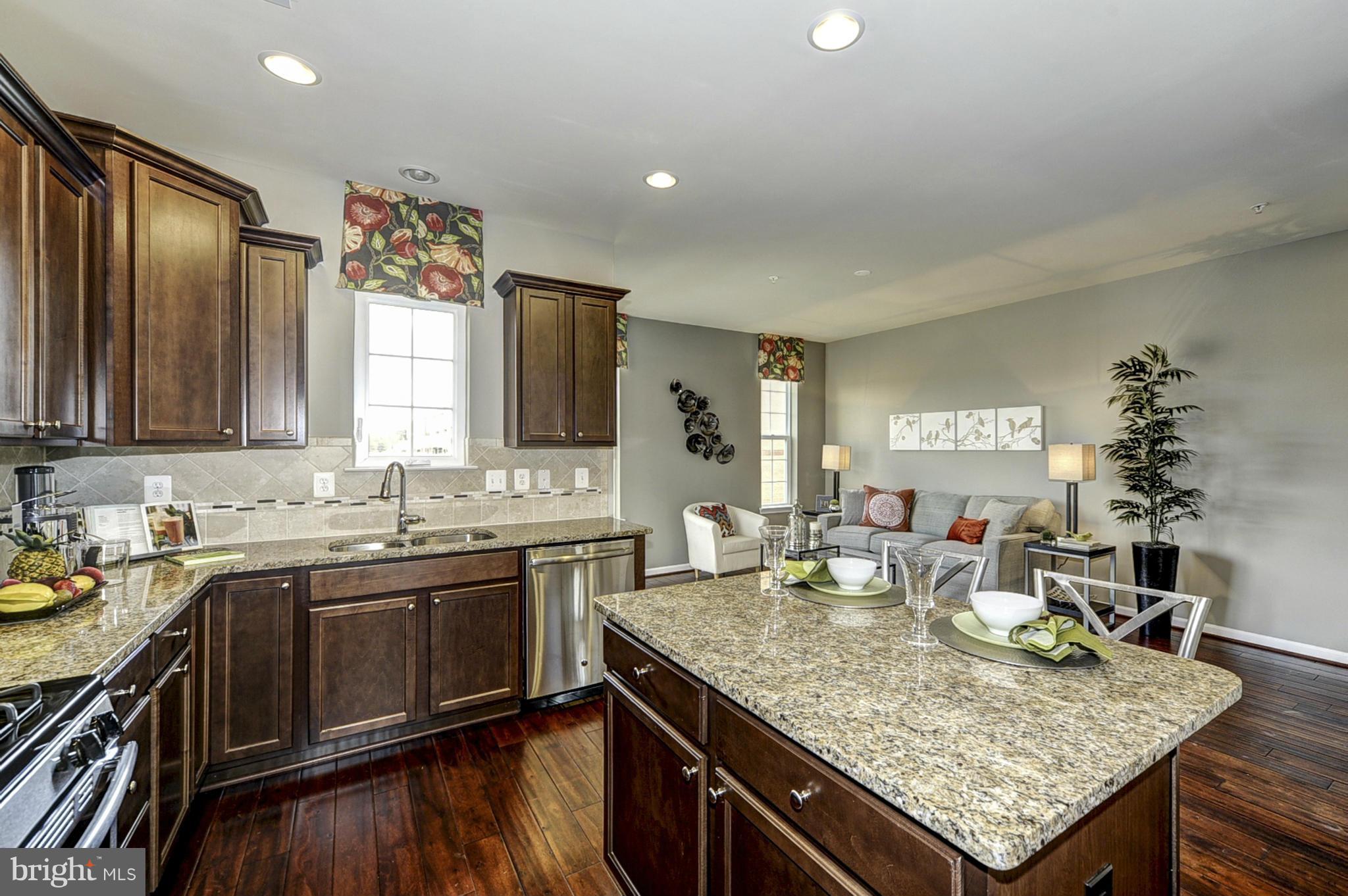 1003 Red Clover Road Gambrills, MD 21054 - Photo 5 of 30 a kitchen with center island and sink