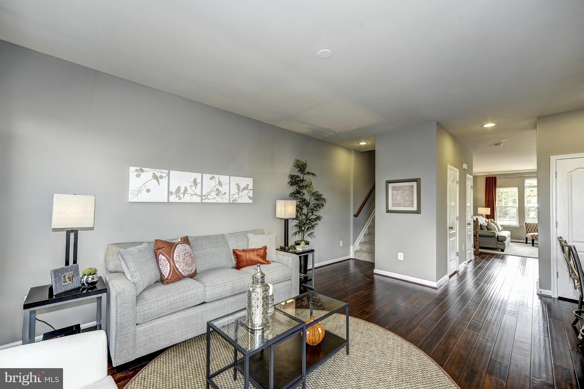 1003 Red Clover Road Gambrills, MD 21054 - Photo 6 of 30 a living room with furniture and a wooden floor