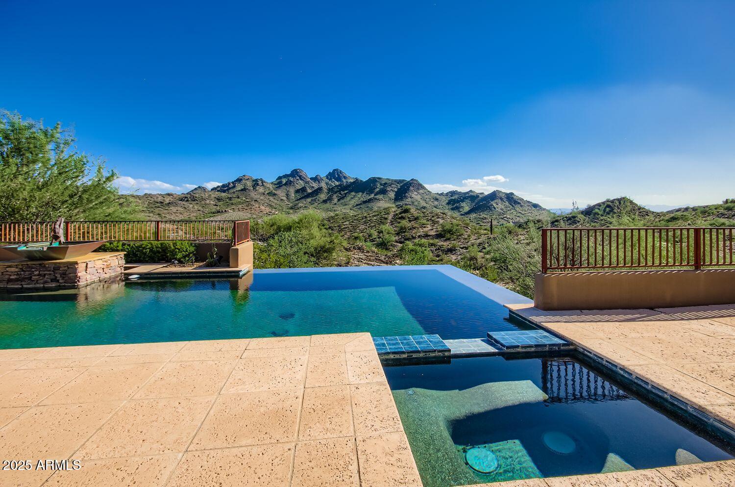 a view of swimming pool with lounge chair