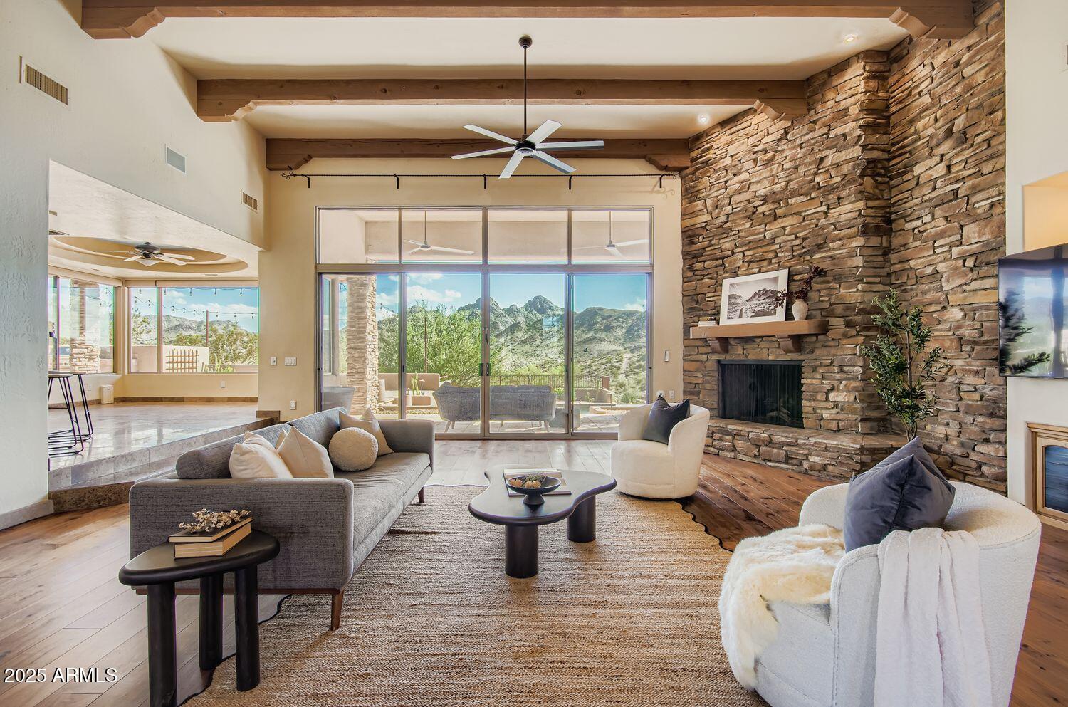 9247 North 24th Way Phoenix, AZ 85028 - Photo 9 of 99 a living room with furniture and a fireplace