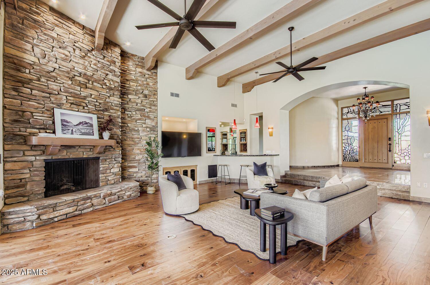 9247 North 24th Way Phoenix, AZ 85028 - Photo 93 of 99 a living room with furniture and a fireplace