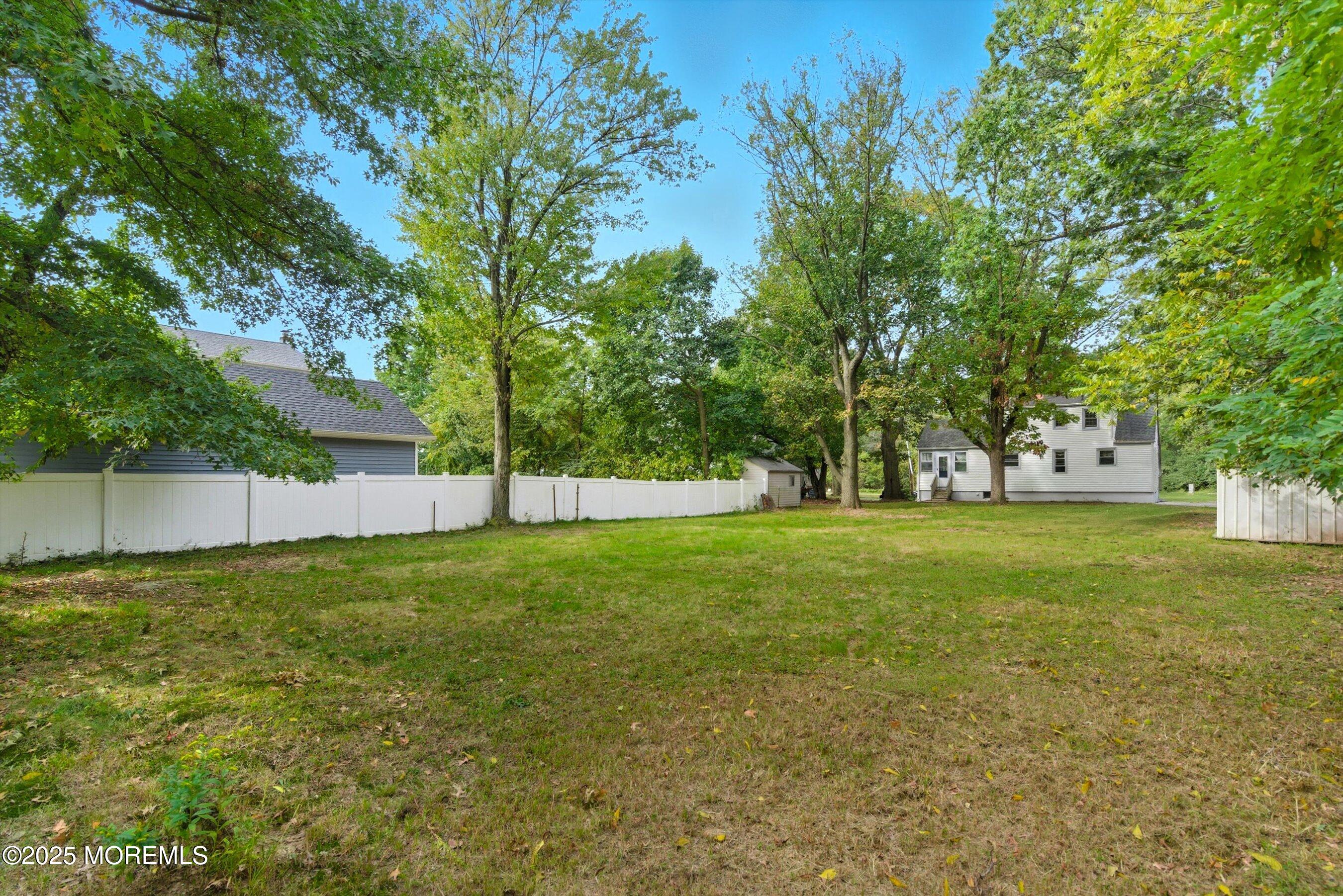 174 Alcoa Avenue Edison, NJ 08837 - Photo 20 of 20 a view of yard with green space