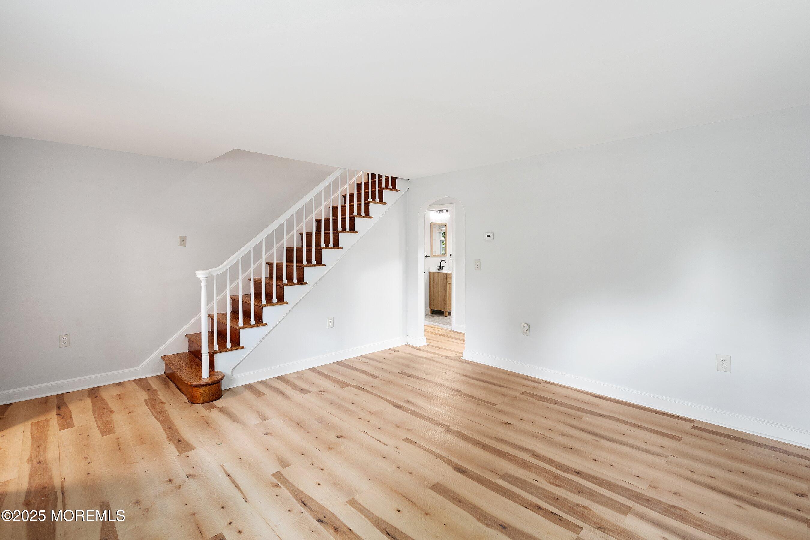 174 Alcoa Avenue Edison, NJ 08837 - Photo 3 of 20 a view of entryway with wooden floor