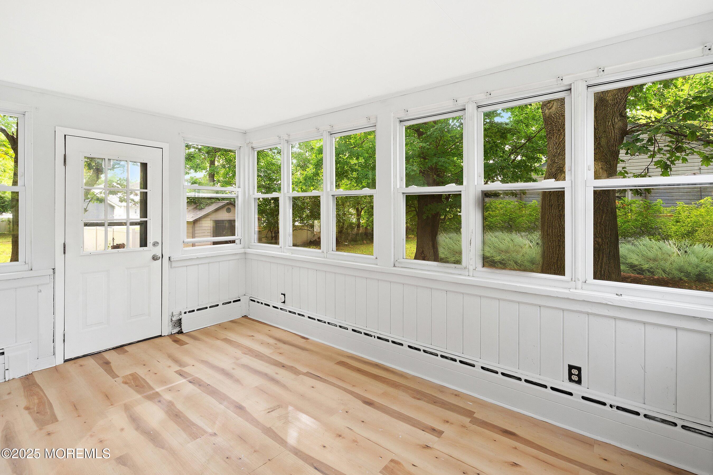 174 Alcoa Avenue Edison, NJ 08837 - Photo 7 of 20 a view of empty room with large windows
