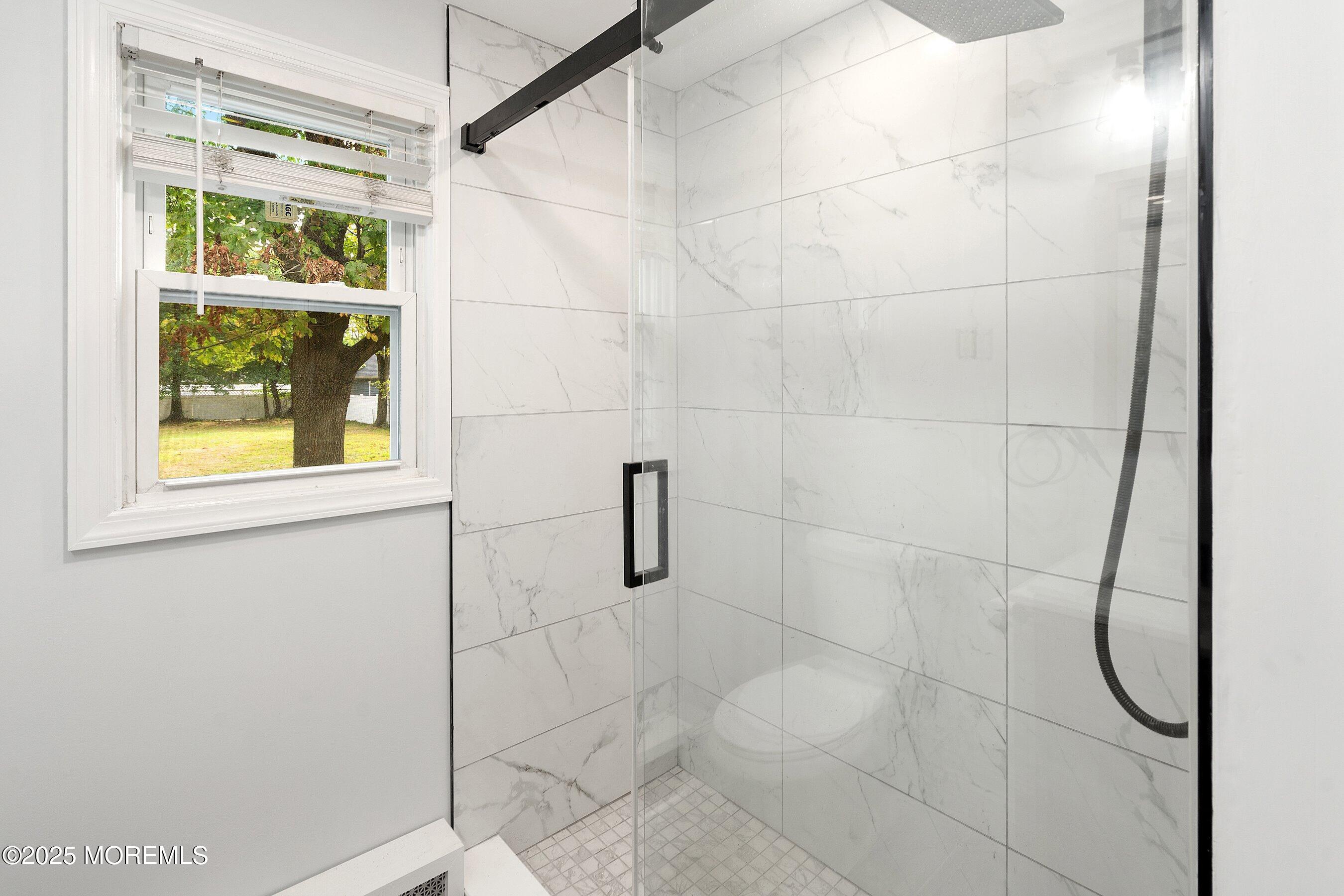 174 Alcoa Avenue Edison, NJ 08837 - Photo 9 of 20 a bathroom with a shower