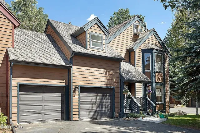 a view of a house with a street