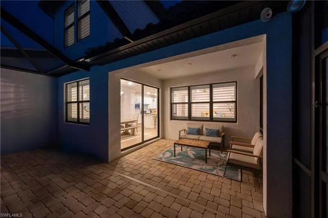 a view of a backyard with a swimming pool