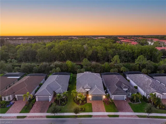 an aerial view of a house with a garden