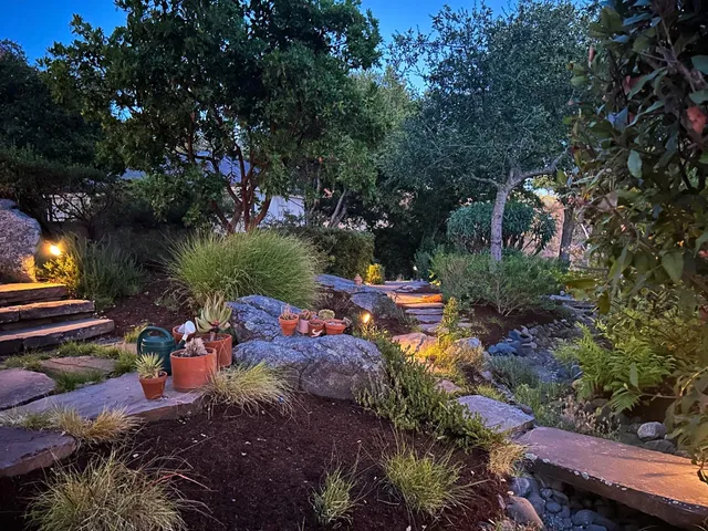 a view of a lake with sitting area
