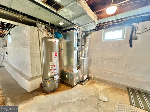 a view of walk in closet with window