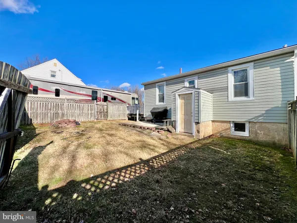 a house with trees in front of it