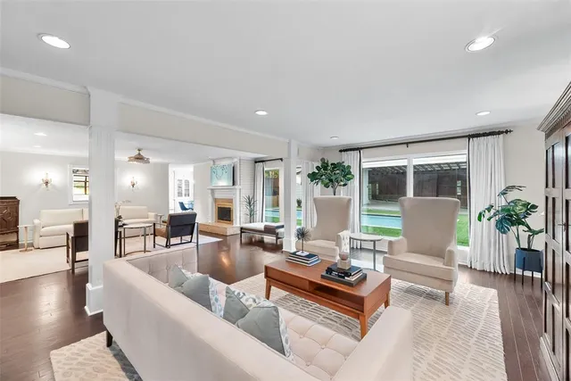 a living room with furniture and a table