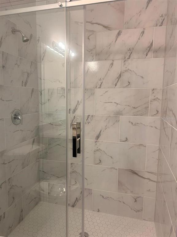 9451 North Emellia Avenue Citrus Springs, FL 34433 - Photo 11 of 24 a bathroom with a shower