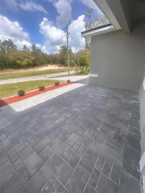 9451 North Emellia Avenue Citrus Springs, FL 34433 - Photo 4 of 24 a view of an empty room with a ocean view