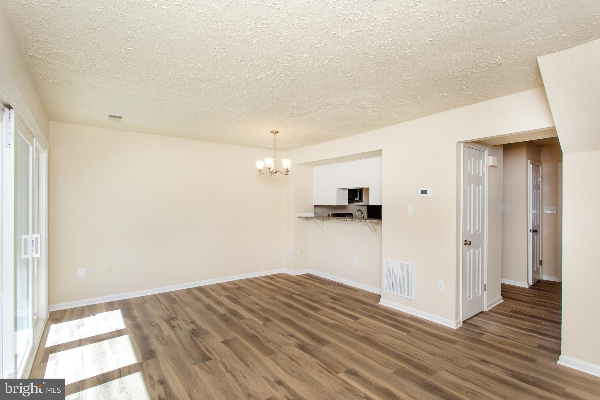3147 Heath Cote Road Waldorf, MD 20602 - Photo 11 of 33 a view of kitchen with wooden floor