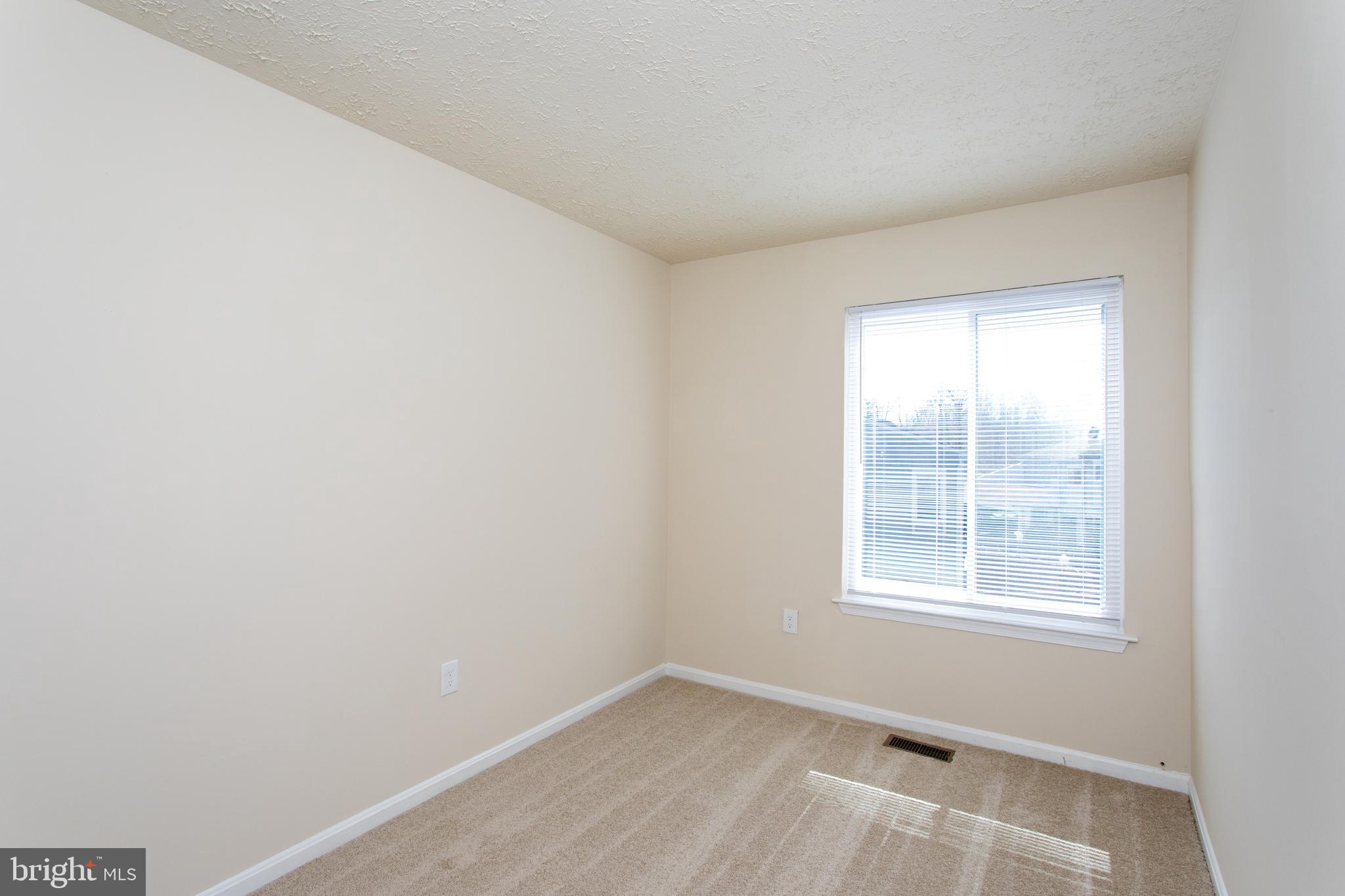 3147 Heath Cote Road Waldorf, MD 20602 - Photo 23 of 33 an empty room with a window