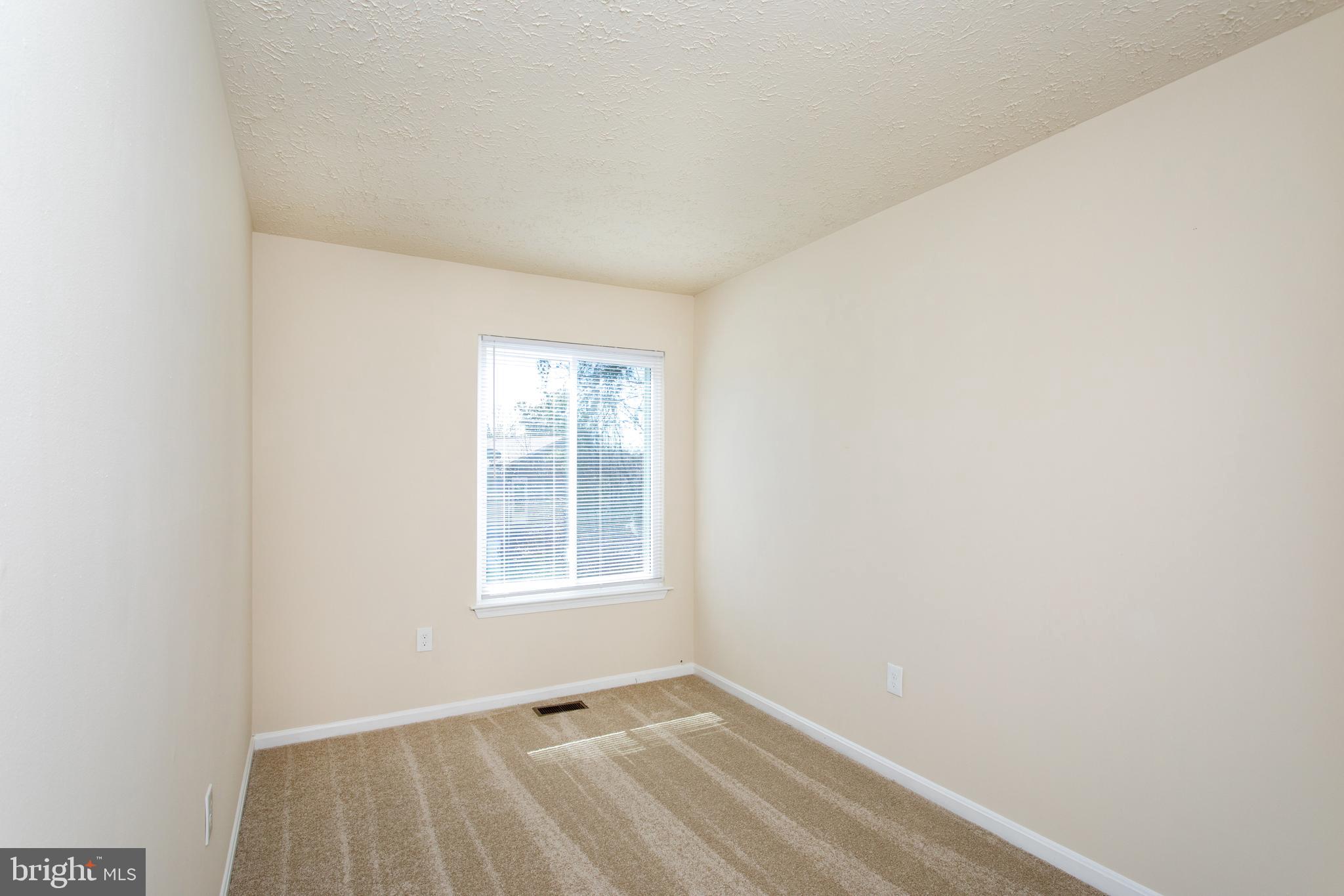 3147 Heath Cote Road Waldorf, MD 20602 - Photo 30 of 33 an empty room with windows