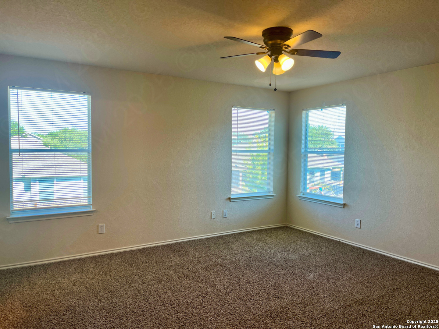 11027 Chicory Field Helotes, TX 78023 - Photo 13 of 22 a view of an empty room with a window