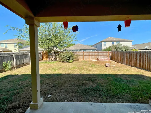 a view of yard with outdoor seating