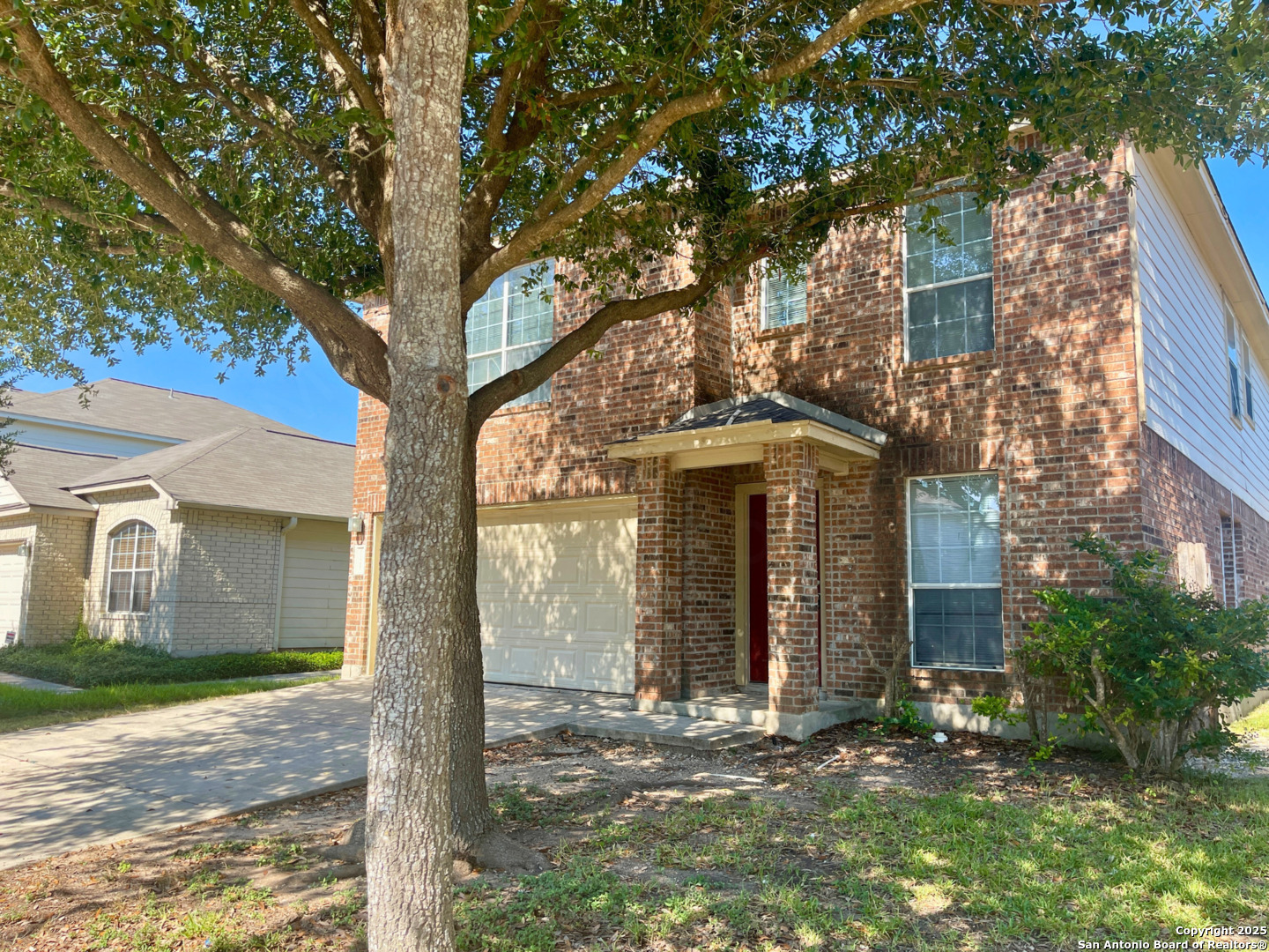 11027 Chicory Field Helotes, TX 78023 - Photo 4 of 22 a front view of a house with a yard