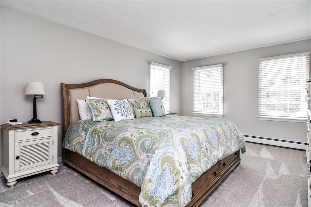 16 Russet Hill Road Ashland, MA 01721 - Photo 18 of 30 a bedroom with a bed and a window